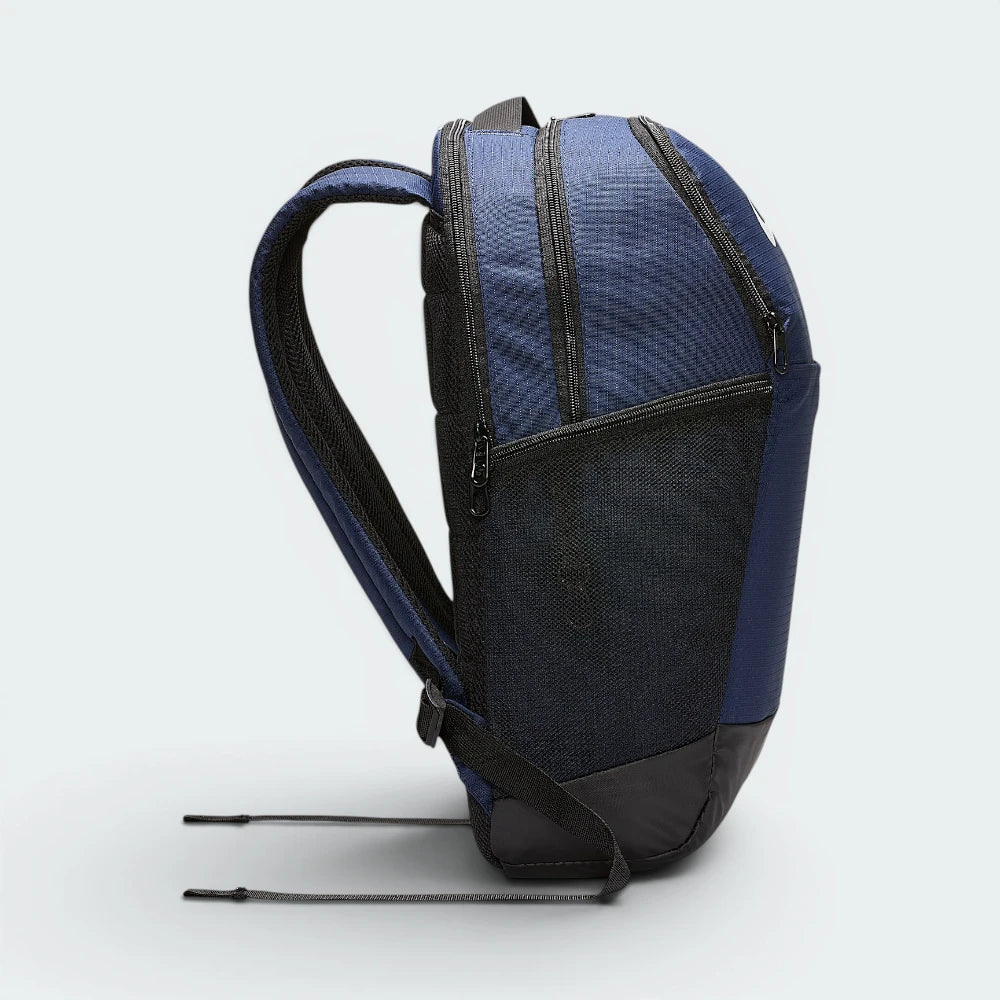 Highlights the high-velocity sweep of the contoured shoulder straps, showing the professional, clean texture of the navy woven polyester body, the mesh side bottle pocket, and the deep black zipper tracking bands.