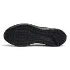 Full-length bottom profile showing the black carbon rubber outsole, highlighting the Waffle-inspired rectangular traction lugs, segmented lateral crash rail, forefoot flex grooves, and debossed Nike Swoosh.