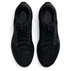 Direct overhead view of both shoes, displaying the streamlined breathable mesh toe boxes, central lacing system with flat black laces, padded tongue with circular Nike Pegasus running badges, and dark cushioned footbeds.