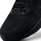 Macro close-up of the forefoot and midfoot, highlighting the precision circular and linear mesh perforation matrix, reinforced TPU eyestays, and "EST. 1972" toe cap stamp.