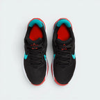 Focuses on the locked-in standard cut lacing layout, displaying the perfect symmetry of the black mesh tongue, black laces, and the breathable perforations guarding the front toe box area.