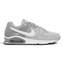 Highlights the high-velocity sweep of the contrasting white Nike Swoosh, showing the professional, multi-textured grey mesh underlays, the clean Stealth grey overlays, and the prominent visible Max Air window embedded in the heel of the foam midsole.