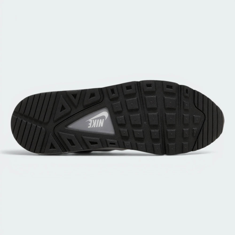 Displays the iconic tread pattern of the durable rubber Waffle outsole, showcasing the square lug arrangement engineered for unreal everyday multi-surface street grip.