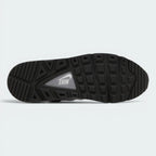 Displays the iconic tread pattern of the durable rubber Waffle outsole, showcasing the square lug arrangement engineered for unreal everyday multi-surface street grip.