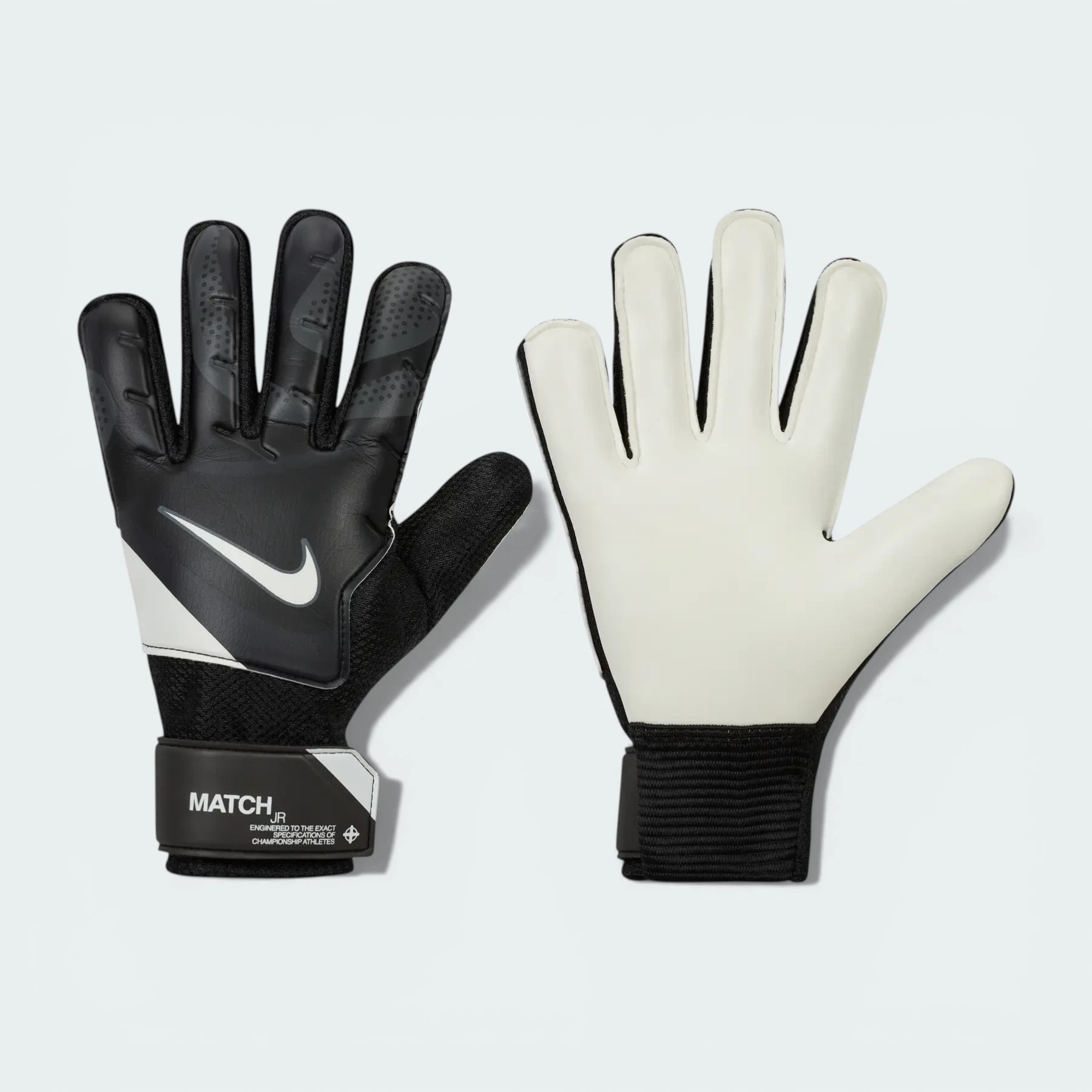 Overhead view of both gloves laid flat, showcasing the smooth latex palm and the high-contrast Nike Swoosh on the backhand.