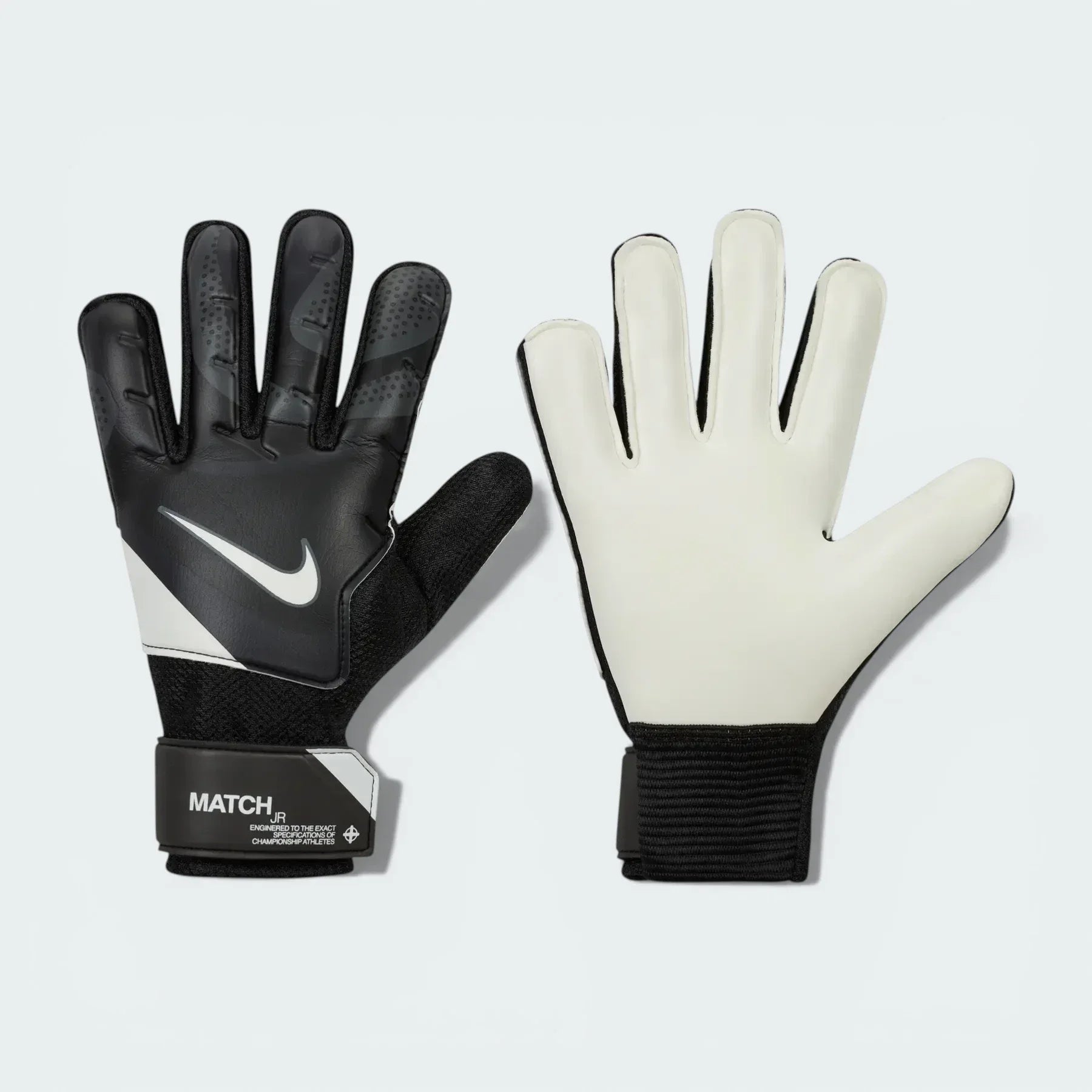 Overhead view of both gloves laid flat, showcasing the smooth latex palm and the high-contrast Nike Swoosh on the backhand. Main image