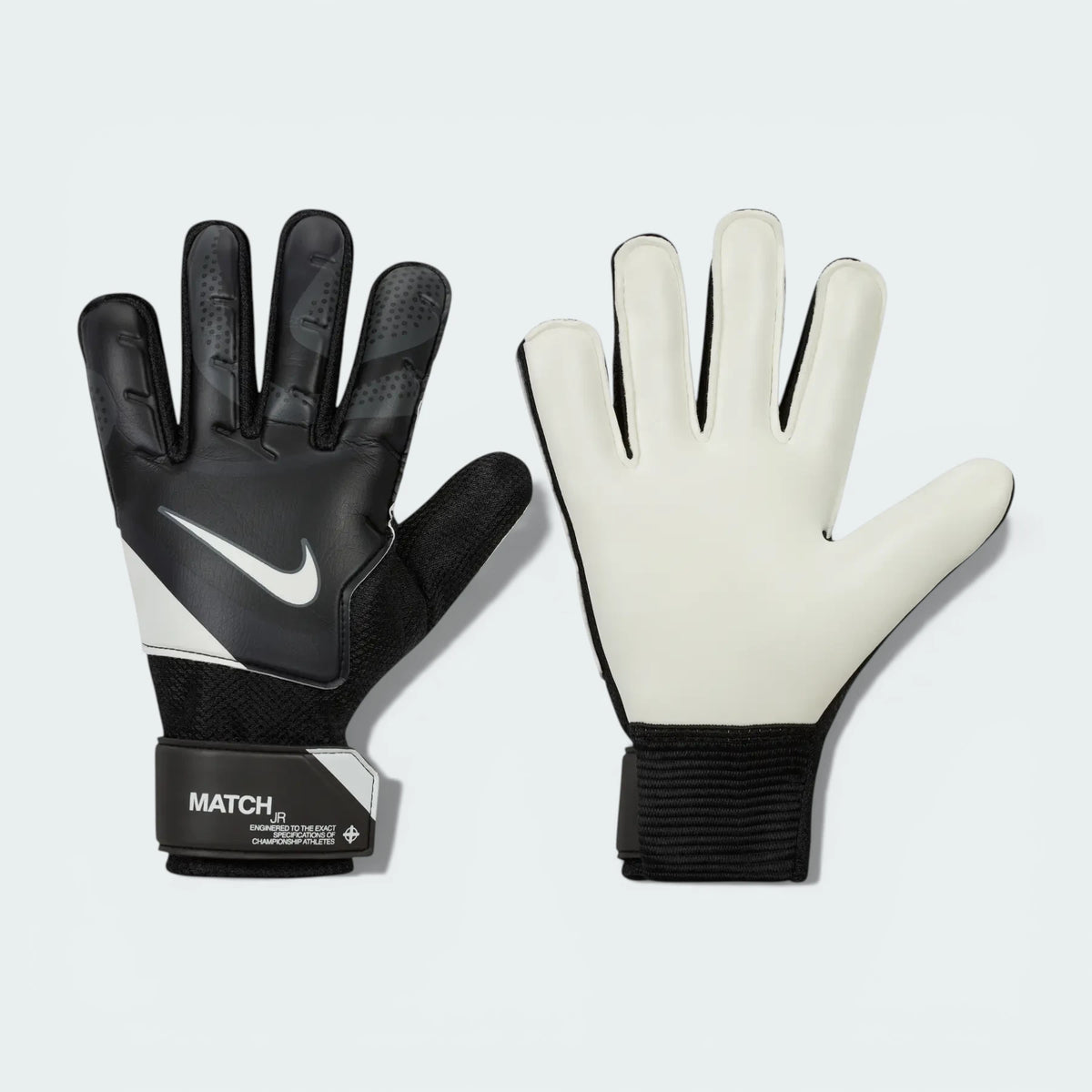 Overhead view of both gloves laid flat, showcasing the smooth latex palm and the high-contrast Nike Swoosh on the backhand.
