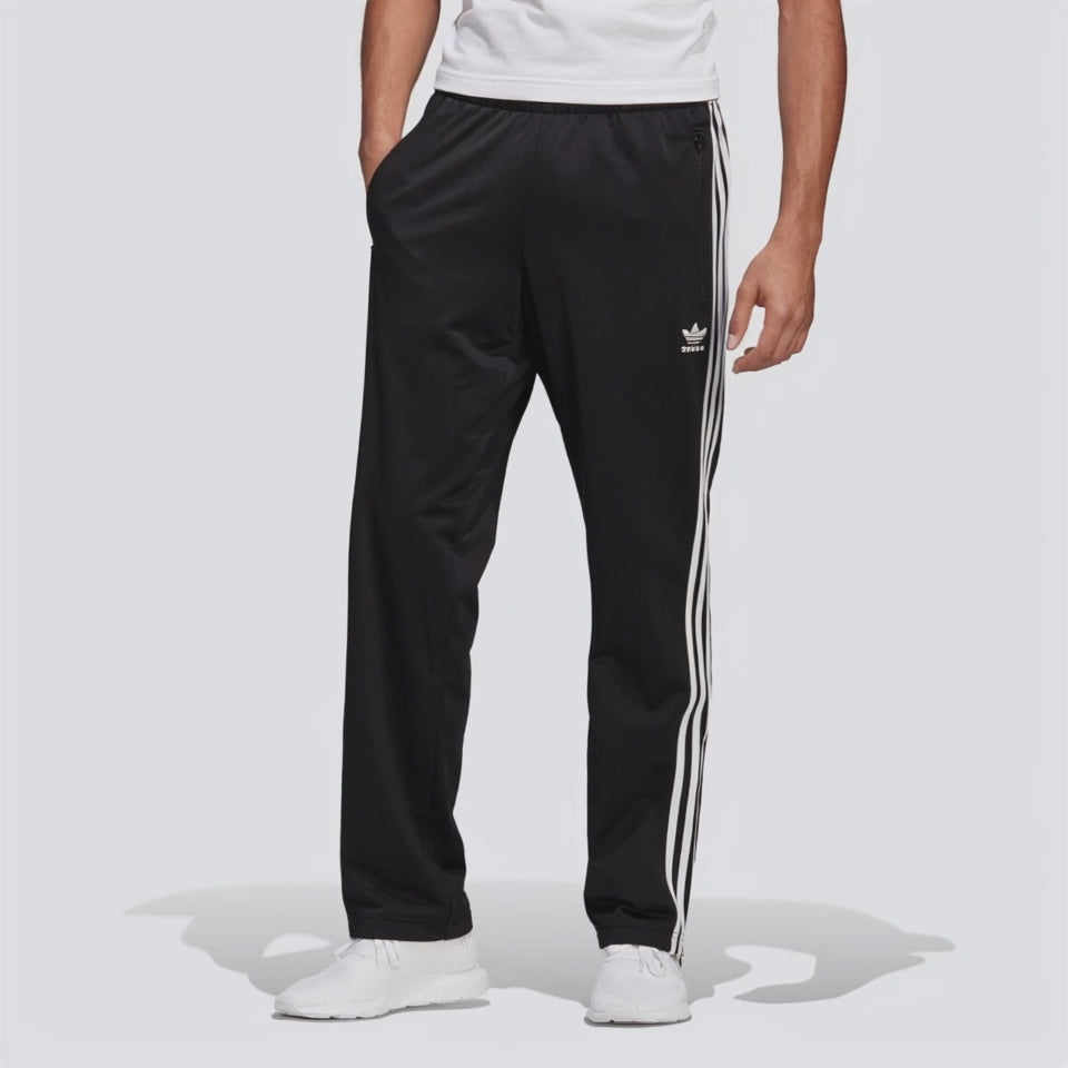 Video showing the fit and style of the adidas Firebird track pants