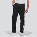 Video showing the fit and style of the adidas Firebird track pants