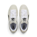 Direct overhead look at both shoes, displaying the rounded Sand suede toe boxes, oversized white fat laces across heavily padded foam tongues with black-and-white woven PUMA tags, and dark footbeds.