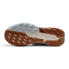 Trade Sports Nike ReactX Pegasus Trail 5 women's running shoe showing the brown and white all-terrain rubber outsole.