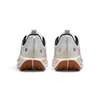 Trade Sports Nike Women's ReactX Pegasus Trail 5 in white and blue with a brown all-terrain rubber outsole, rear view.