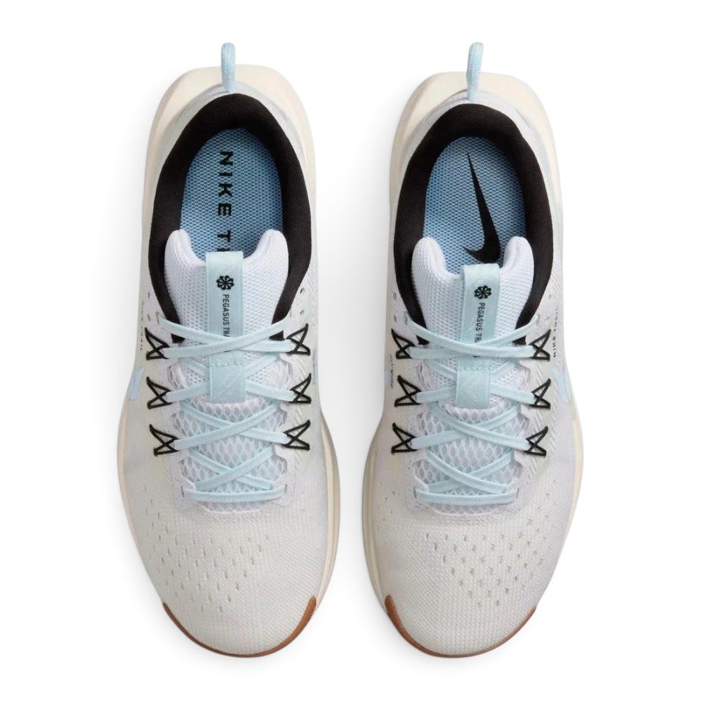 Trade Sports Nike Women's ReactX Pegasus Trail 5 running shoes in white with blue tint accents and mesh upper.