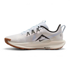 Trade Sports Nike Women's ReactX Pegasus Trail 5 in white and blue with a brown all-terrain rubber outsole.