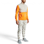 Full size model worn Under Armour Rival Fleece Camo Track Pants in onyx white, showing the soft fleece texture and the camouflage print.