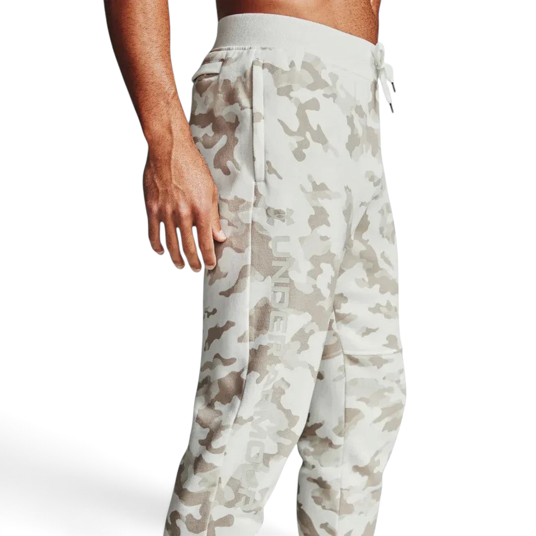 Under Armour Rival Fleece Camo Track Pants Men's in onyx white, side profile showing the full length, tapered leg, and camouflage pattern.