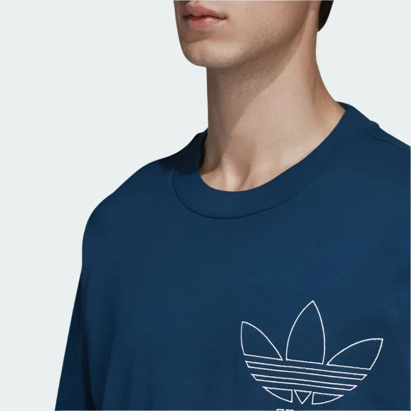 Close-up of the Trefoil outline logo on the adidas Originals Trefoil Outline T-Shirt Men's in Legend Marine, highlighting the bold graphic and clean stitching.