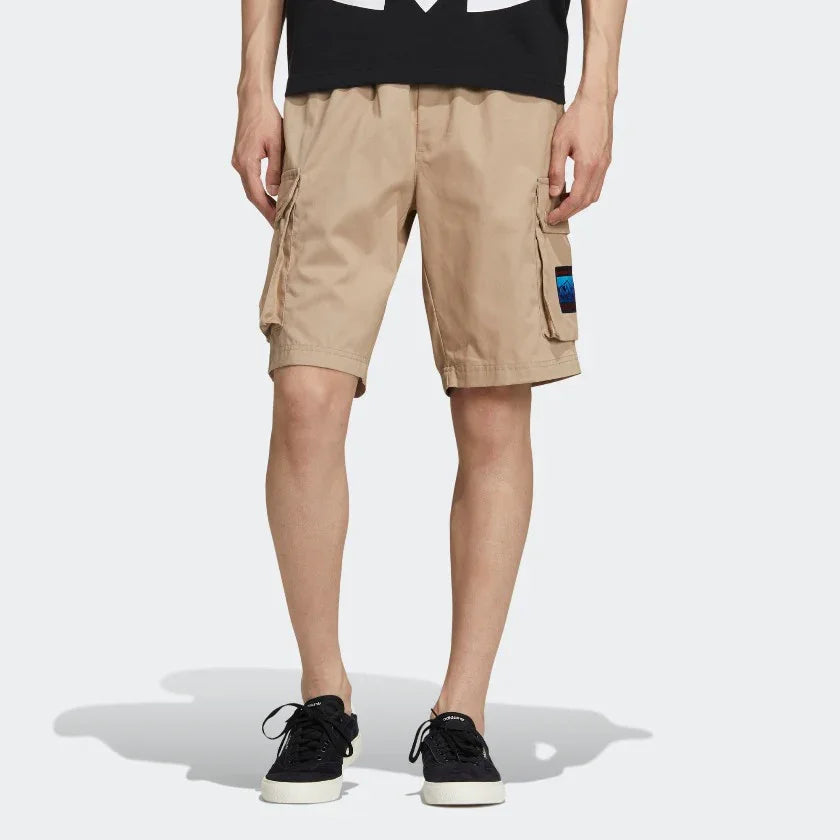adidas Adiplore Men's Cargo Utility Shorts GP1120 worn standing showing relaxed fit and outdoor style Main image