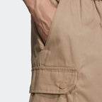 Close-up of adidas Adiplore Men's Cargo Utility Shorts GP1120 pocket and side