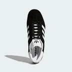 Top-down view of adidas Originals Gazelle Men's trainers showing laces, tongue, and gold logo details