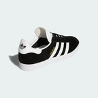 Back view of adidas Originals Gazelle Men's shoes with white heel tab and adidas Trefoil logo