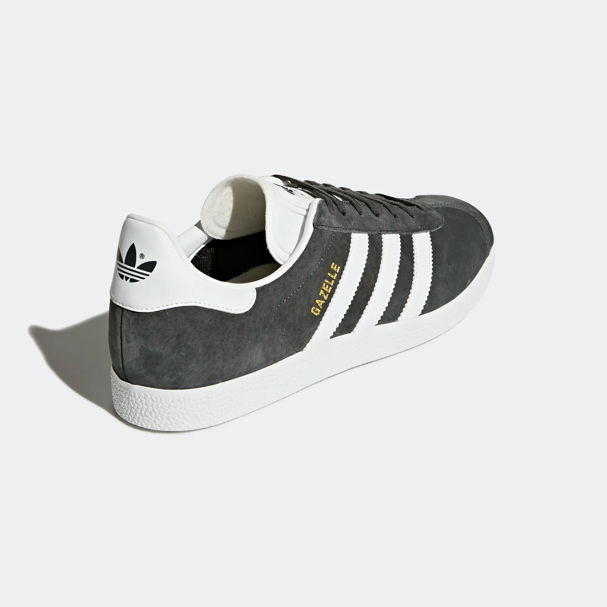 Angled side view of adidas Originals Gazelle Men's sneakers highlighting shape and colour contrast