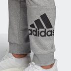 A close-up of the screen-printed Badge of Sport and the textured marl fabric.