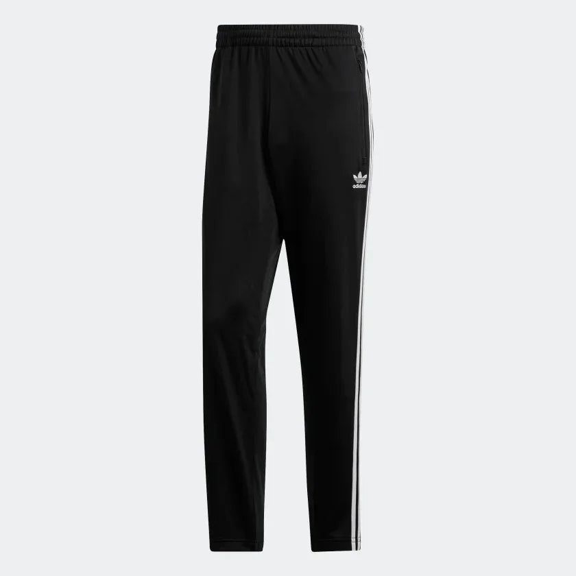 Adidas Firebird Track Pants Men's in black, front view showing white 3-Stripes down the legs, Trefoil logo on the hip, and zipped pockets.