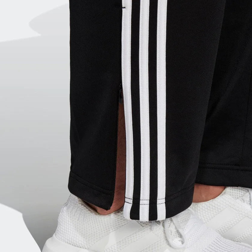 Detailed zoom on the ribbed ankle cuff of the Adidas Firebird Track Pants, highlighting the adjustable fit and clean finish.
