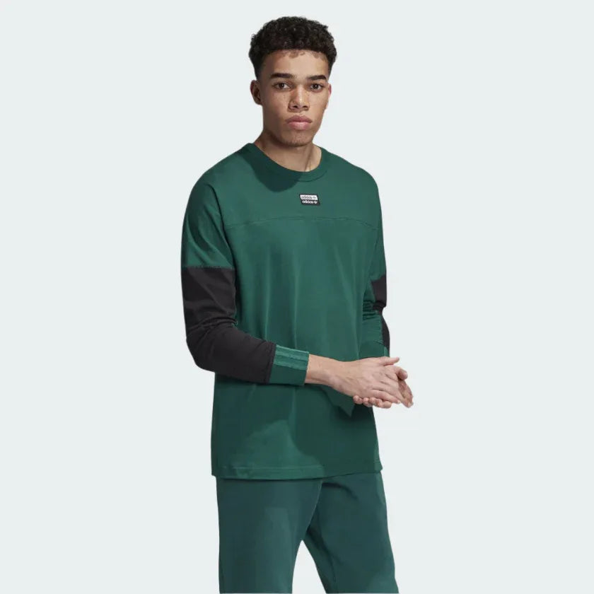 Adidas R.Y.V. Long Sleeve Men's T-Shirt in green, front view showing ribbed crew neck, long sleeves, and bold R.Y.V. branding on the chest. Main image