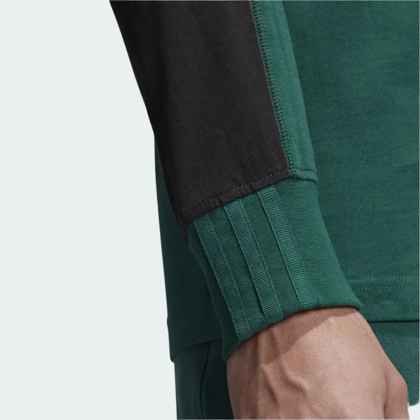 Detailed zoom on the ribbed crew neck collar or ribbed cuff of the Adidas R.Y.V. Long Sleeve Men's T-Shirt, highlighting the fabric finish.