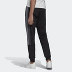 Emphasising the "locked-in" ribbed cuffs and the retro-sport silhouette.