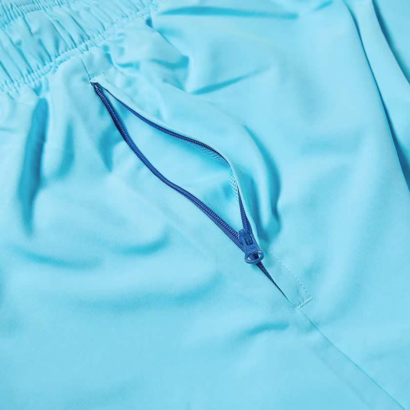 Close-up of adidas Adiplore 2.0 Woven Shorts GP1124 zipped pockets