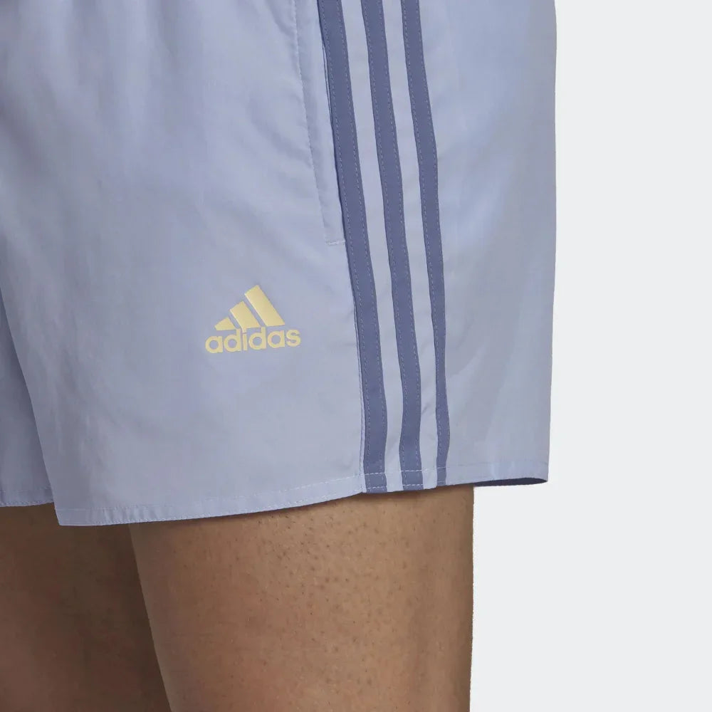 Close-up of adidas Classic 3-Stripes Men's Swim Shorts GU0322 lightweight quick-dry fabric and Trefoil branding