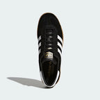 Top view of adidas Hamburg Men's trainers showing laces, tongue branding, and low-cut profile