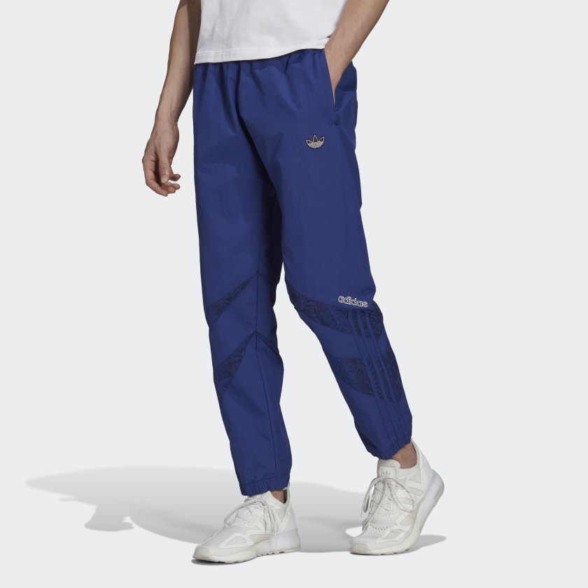 Adidas pants with stripes halfway sales down